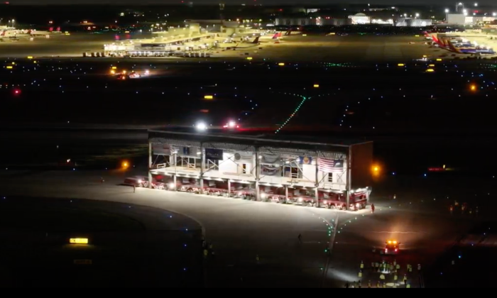 The modular units were transported a mile across the airfield