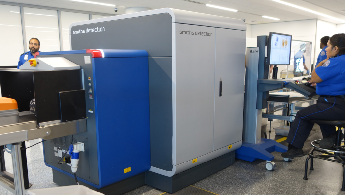 TSA staff operate a Smiths Detection screener at LAX