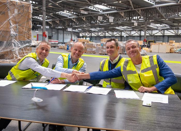 The official signing ceremony at Menzies’ cargo facility at AMS