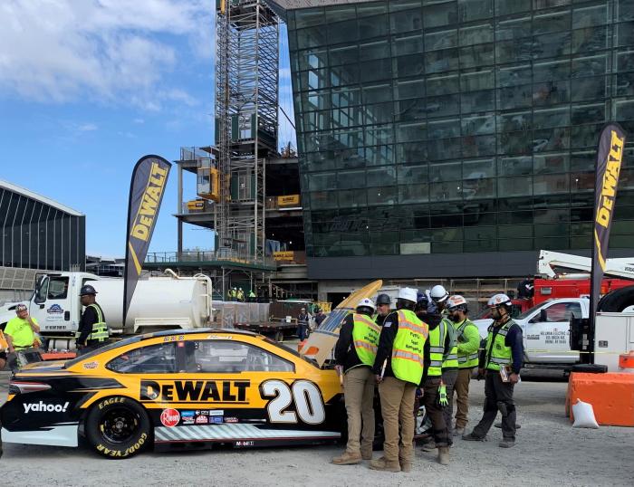 Attendees had their pictures taken with Christopher Bell’s iconic #20 DEWALT NASCAR show car 