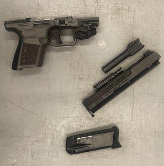 This disassembled firearm was detected by TSA officers at EWR. The parts were concealed in a boot and in a LEGO box