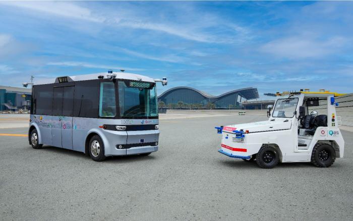 The trial involves autonomous buses and tractors